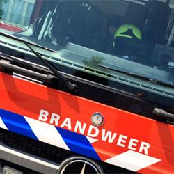 Brand bovenin antennemast tijdens sloop